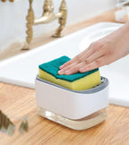 Hand placing sponge in white kitchen sponge holder near sink